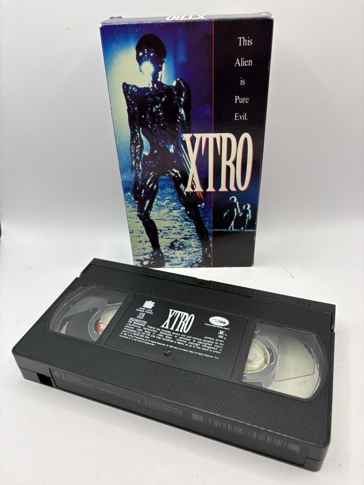 Xtro VHS VCR Video Tape Used Movie Horror Sci Fi Slip Sleeve VERY RARE