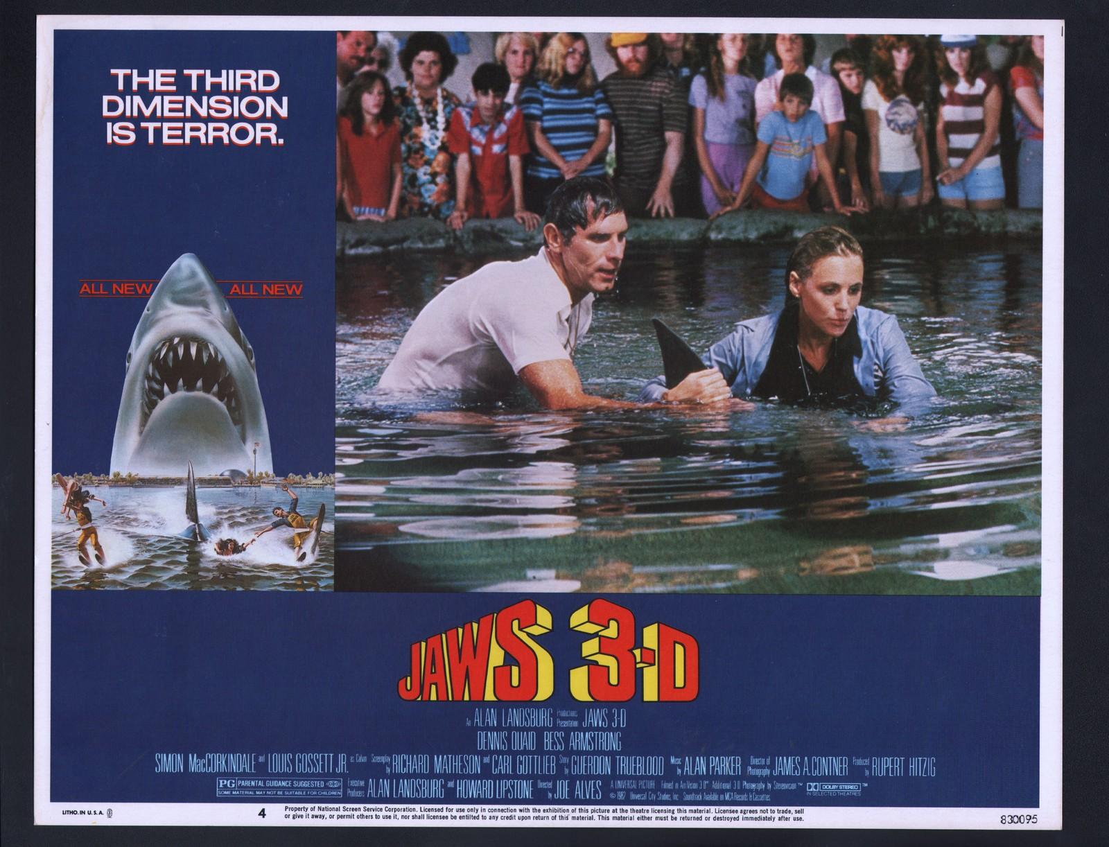 Jaws 3-D Lobby Card #4-1983-Dennis Quaid holding a shark fin. 