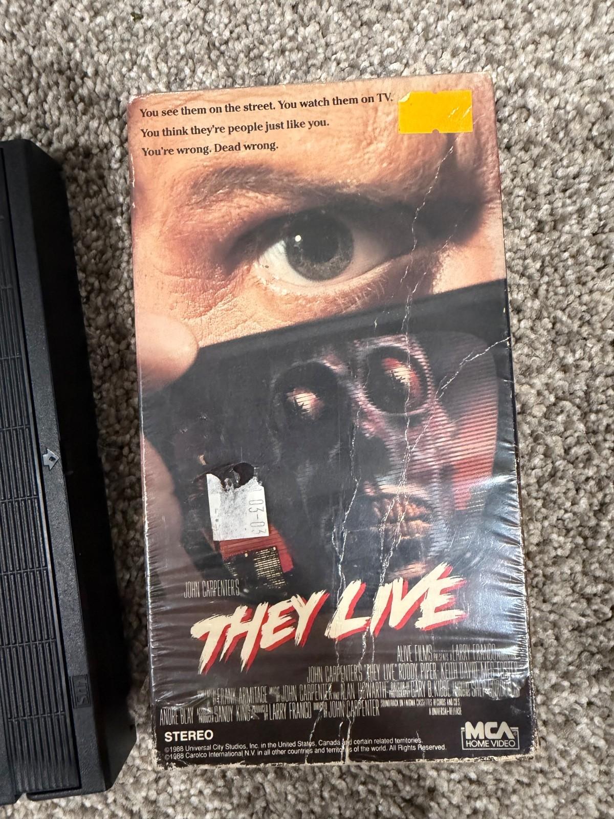 THEY LIVE (Used 1989 VHS Starring Rowdy Piper) opened with shrink wrap RARE OOP